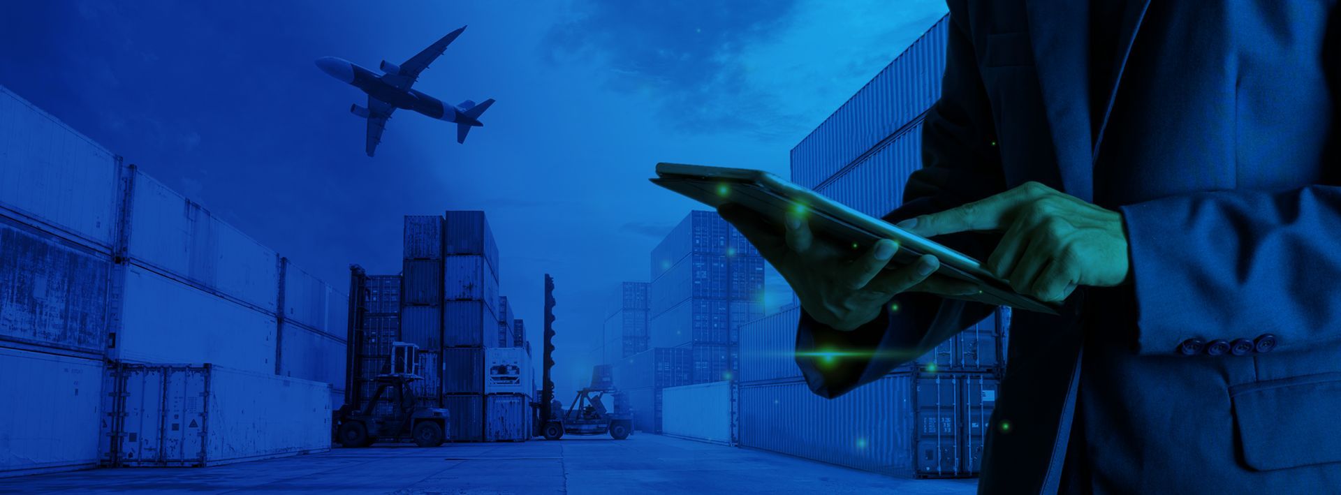 BLK logistics specialists reviewing an operation in front of container cargo